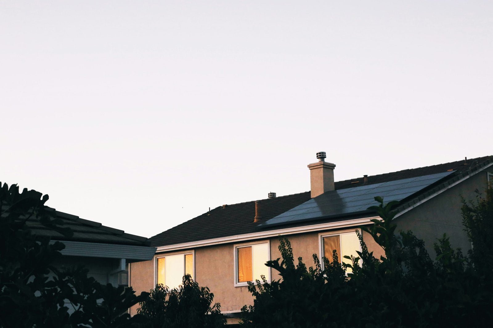 Should Solar Panels Be Cleaned? How Should I Clean My Solar Panels? 3 brown and white concrete house